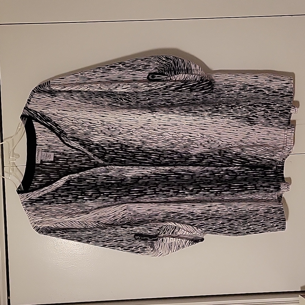 Black and white patterned blouse with black trim and buttons by Catherine's 3x